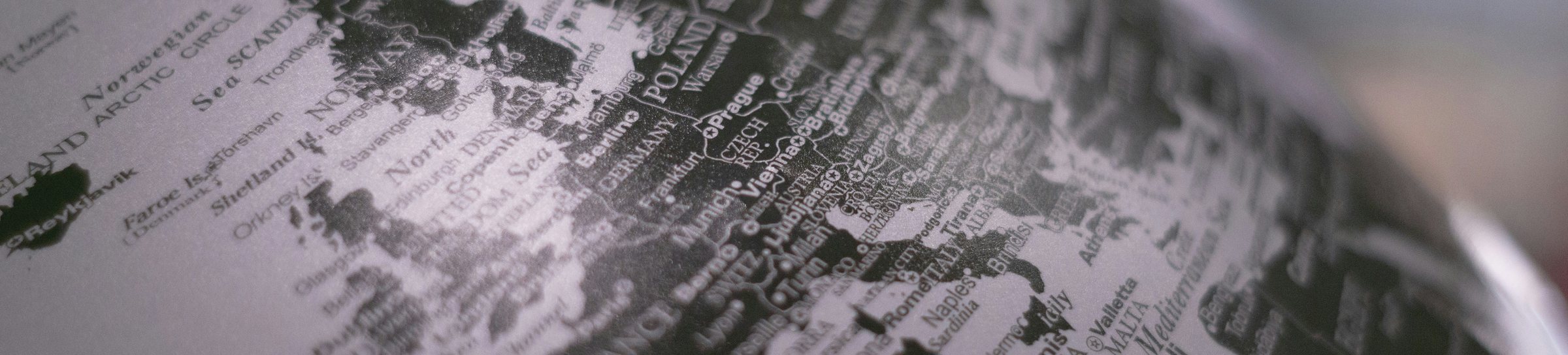 Close up of a desk globe in greyscale